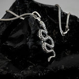 The Serpent's Coil Silver Pendant