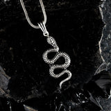 The Serpent's Coil Silver Pendant